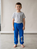 Pantaloni sport copii albaștri cu imprimeu Tom